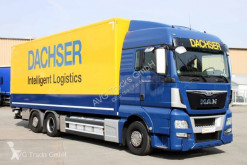 Teherautó MAN TGX 26.400 XLX Koffer 8,2 m LBW 2t Lenkachse használt furgon