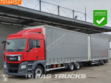 Autotreno MAN TGX 26.480 Teloni scorrevoli (centinato) usato