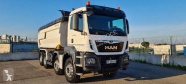 Camión MAN TGS 35.460 volquete benne TP usado