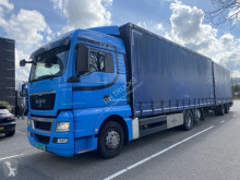 Autotreno MAN TGX 26.400 Teloni scorrevoli (centinato) usato