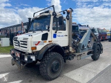 Camião Unimog U5000 poli-basculante usado