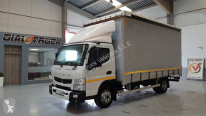 Грузовик Fuso Canter шторный б/у