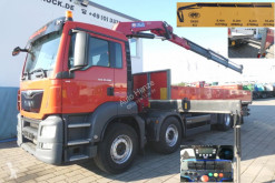 MAN flatbed truck TG-S 35.360 8x2 BL Pritsche Kran Kran 26m to