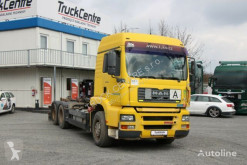 Camión Gancho portacontenedor MAN TGA 26.463 MANUAL 6x2 RETARDER