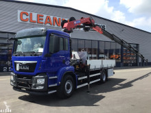Vrachtwagen MAN TGS tweedehands platte bak
