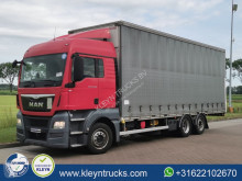 Camion MAN TGX 26.480 Teloni scorrevoli (centinato) usato
