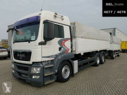 MAN tarp trailer truck TGS TGS 26.400 / Lenkachse / With Trailer