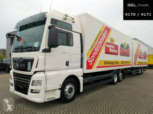 MAN box trailer truck TGX TGX 26.500 / Intarder / Durchlade / with trailer