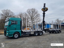 Camião reboque transporte de madeira MAN TGX TGX 26.480 + Menke Janzen Holz-Zug