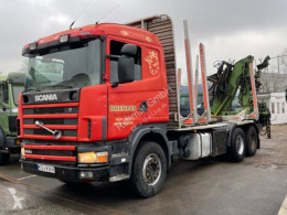 Vrachtwagen houtvrachtwagen Scania R R 144 Holztransporter mit kran loglift 165 zt