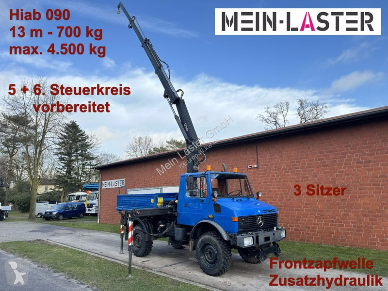 Used Unimog flatbed truck U 1250 Hiab 090 Kran 13 m max. 4,5 t Zapfwelle  4x4 crane - n°9776359