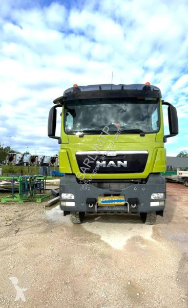 Camión MAN PORTE-POTEAUX 4X4  GRUE FASSI