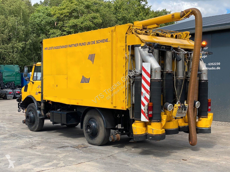 آلة لصيانة الطرق Unimog 427/21 Schienenreiniger