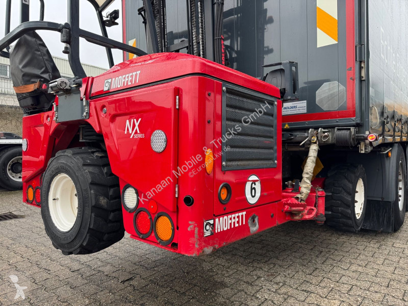 Kamion MAN 26.470 XXL   Mitnahmestapler Moffett...