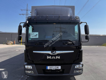 MAN tarp truck