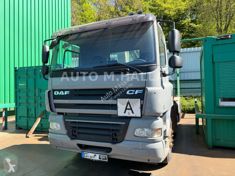 Camión DAF 85460T 8x2 Abroller mit MKG Kran Magnet