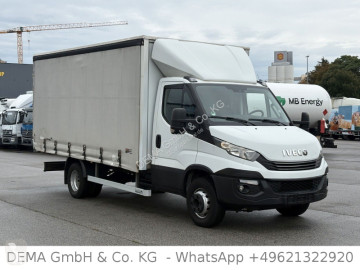 Camião caixa aberta com lona Iveco