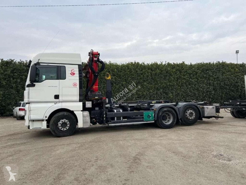 Camion MAN TGX SCARRABILE CON GRU