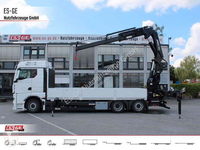 Camion MAN TGX 6x2-4 LL CH mit MKG HLK531 a5