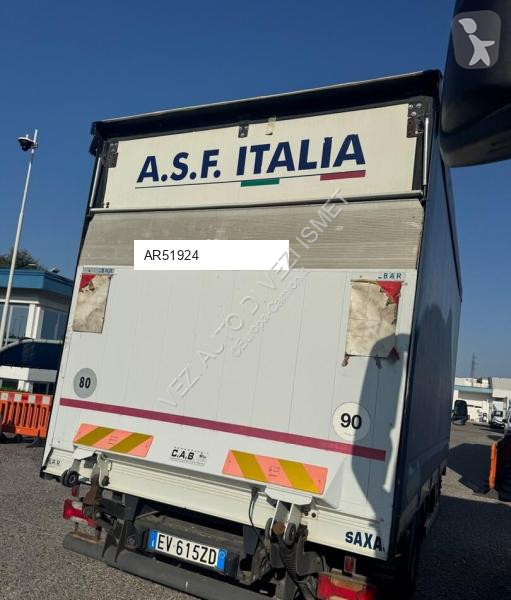 Грузовик Iveco Dailly 65 con telone e pedana...