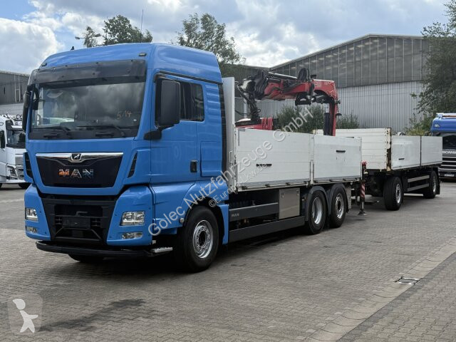Kamion MAN TGX 26.470 Euro 6 Abrollkipper mit...