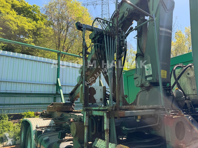 Camión DAF 85460T 8x2 Abroller mit MKG Kran Magnet