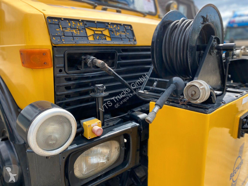 آلة لصيانة الطرق Unimog 427/21 Schienenreiniger
