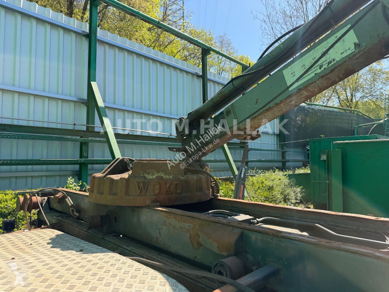 Camión DAF 85460T 8x2 Abroller mit MKG Kran Magnet