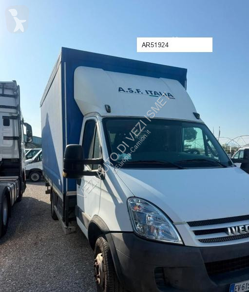 Грузовик Iveco Dailly 65 con telone e pedana...