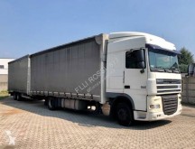Lastbil med släp DAF XF105 410 skjutbara ridåer (flexibla skjutbara sidoväggar) begagnad