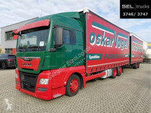 MAN TGX 24.400 6x2-4 LL-U/Lenkachse/Hubd./Int./komp Lastzug gebrauchter Schiebeplanen