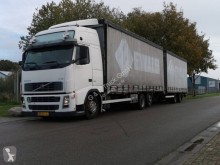 Autotreno centinato alla francese teloni scorrevoli Volvo FH12 420