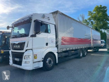 Camión remolque MAN TGX 26.480 tautliner (lonas correderas) usado