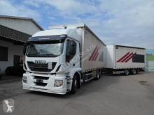 Camion remorque savoyarde système bâchage coulissant Iveco Stralis 260 S 42