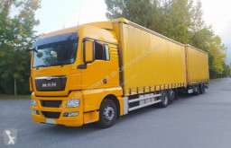 Автопоезд шторный MAN TGX 18.440 XL