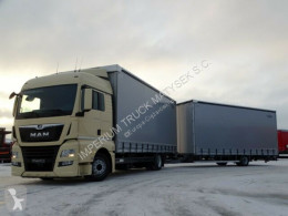 MAN TGX 18.360 / JUMBO TRUCK 120 M3/ VEHICULAR/ 7,7M trailer truck used tautliner