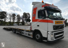 Lastbil med släp containertransport Volvo FH
