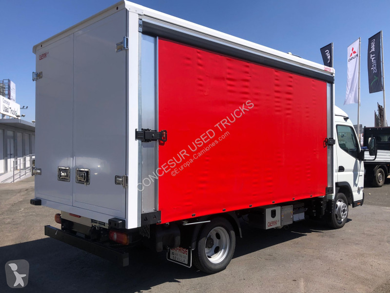 شاحنة مقطورة  Canter 3C15 + CARROCERIA BOTELLERA