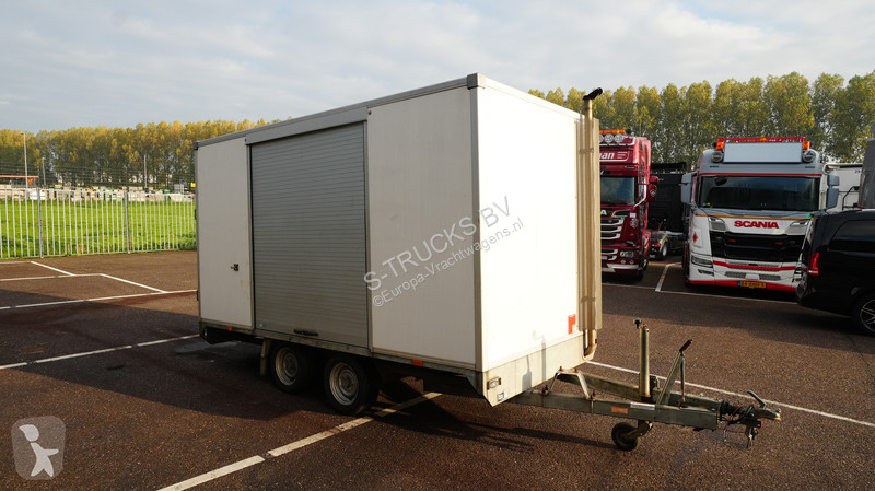 Kamion s návěsem  axle trailer with Atlas Copco...