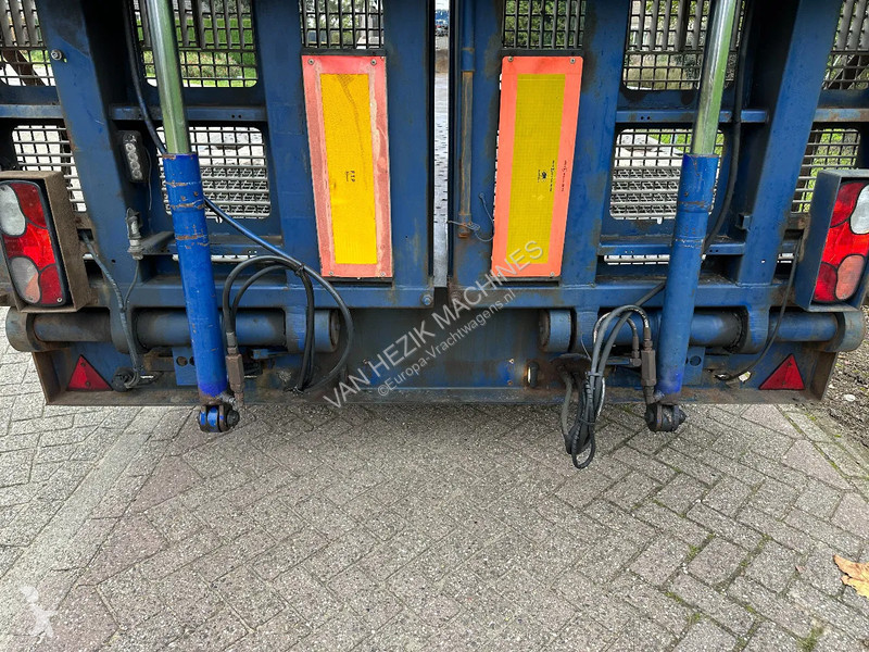 Vrachtwagencombinatie  Dieplader met kleppen