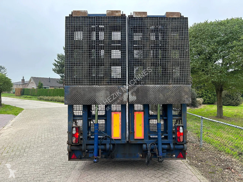 Vrachtwagencombinatie  Dieplader met kleppen