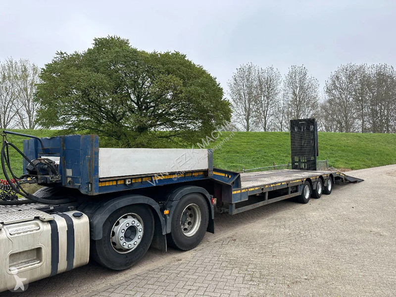Vrachtwagencombinatie  Dieplader met kleppen