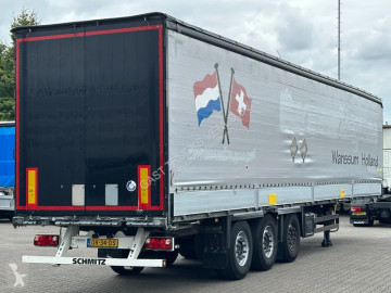 Semitrailer Schmitz Cargobull Schuifzeil met Borden / Disc-Brakes / Huckepack / Code XL / Apk