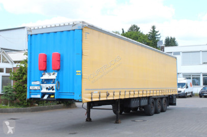 Semi remorque plateau ridelles Krone