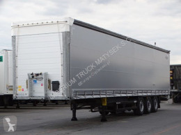 Schmitz Cargobull CURTAINSIDER /STANDARD / LIFTED AXLE/XL CODE semi-trailer used tarp