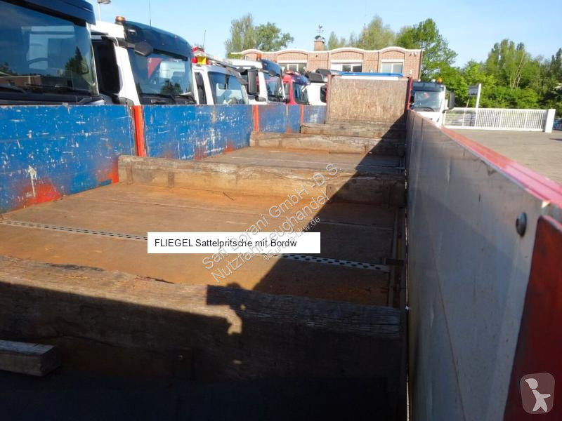 نصف مقطورة Fliegl Sattelpritsche mit Bordwänden...
