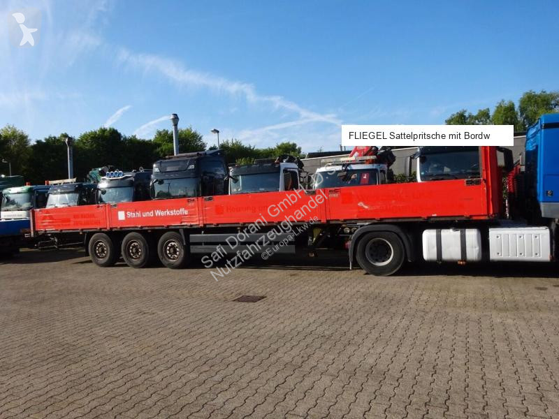 نصف مقطورة Fliegl Sattelpritsche mit Bordwänden...