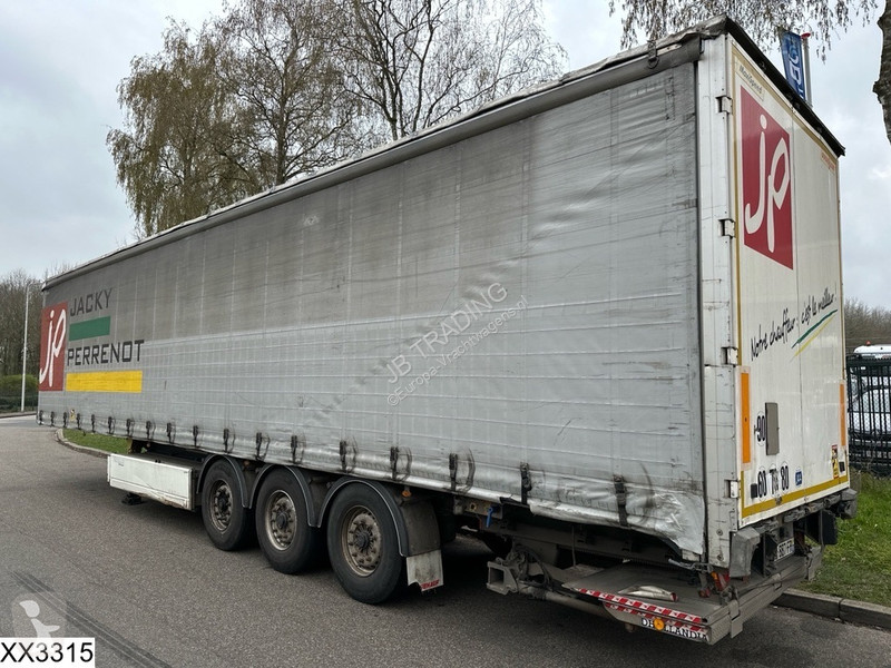 نصف مقطورة Fruehauf Tautliner Dhollandia