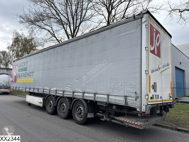 نصف مقطورة Fruehauf Tautliner Dhollandia