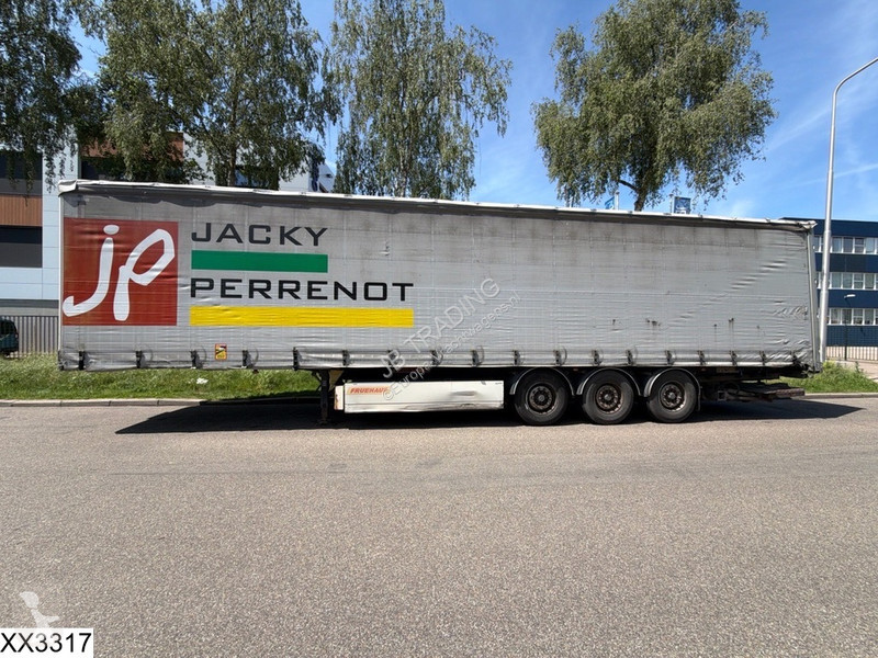 نصف مقطورة Fruehauf Tautliner Dhollandia